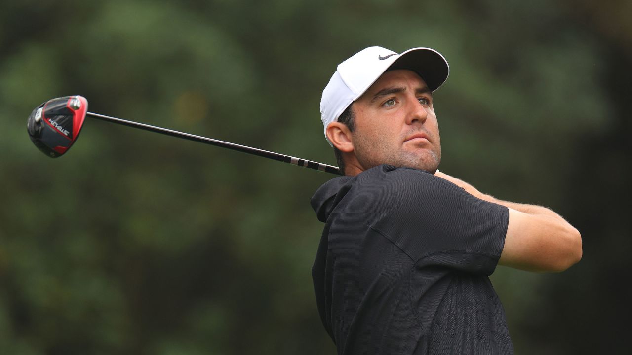 Scheffler warms up during a practice round.