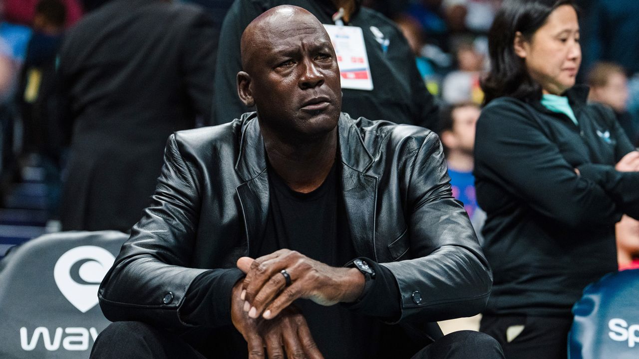 CHARLOTTE, NORTH CAROLINA - MARCH 03: Charlotte Hornets owner Michael Jordan looks on in the fourth quarter during their game against the Orlando Magic at Spectrum Center on March 03, 2023 in Charlotte, North Carolina. NOTE TO USER: User expressly acknowledges and agrees that, by downloading and or using this photograph, User is consenting to the terms and conditions of the Getty Images License Agreement. (Photo by Jacob Kupferman/Getty Images)