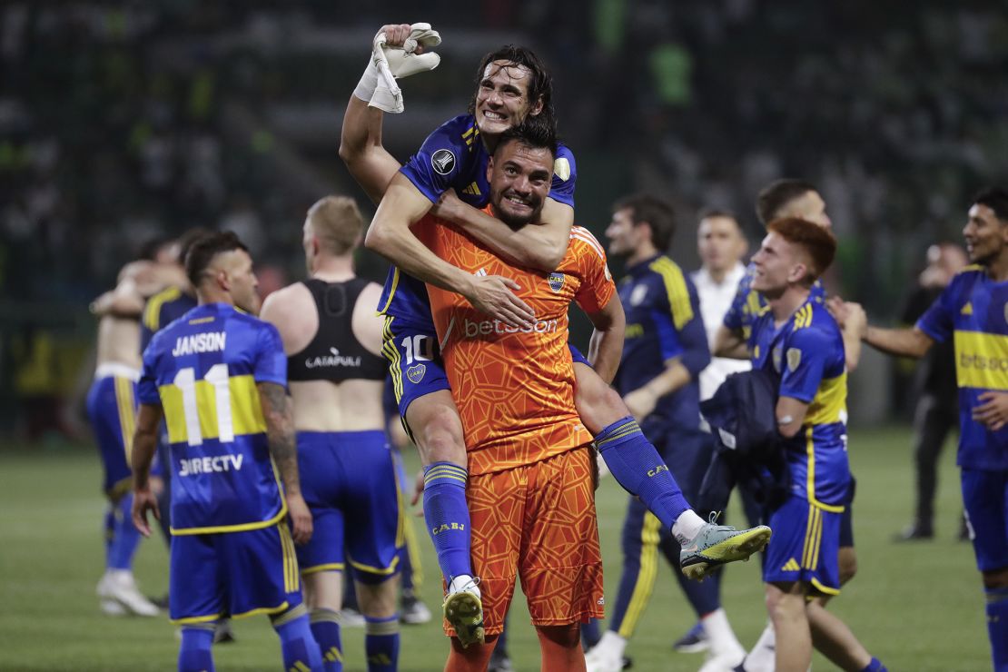 Edinson Cavani of Argentina's Boca Juniors embraces goalkeeper Sergio Romero after defeating Brazil's Palmeiras in a penalty shootout during a Copa Libertadores semifinal second leg soccer match at Allianz Parque stadium in Sao Paulo, Brazil, Thursday, Oct. 5, 2023. (AP Photo/Bruna Prado)