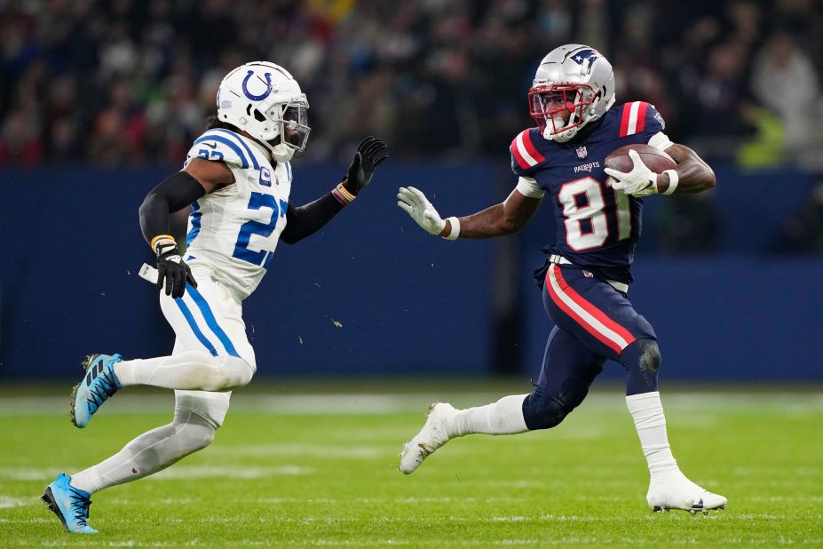 New England Patriots wide receiver Demario Douglas evades Indianapolis Colts cornerback Kenny Moore II. 