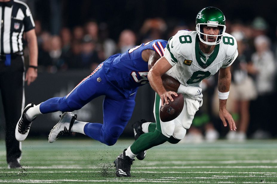 Quarterback Aaron Rodgers, making his debut with the New York Jets, is sacked by Buffalo Bills defensive end Leonard Floyd. Rodgers <a href=