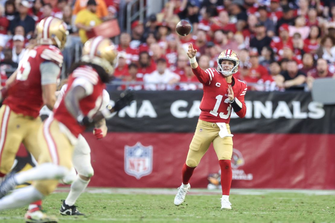 GLENDALE, ARIZONA - DECEMBER 17: Brock Purdy #13 of the San Francisco 49ers throws a pass during the fourth quarter of a game against the Arizona Cardinals at State Farm Stadium on December 17, 2023 in Glendale, Arizona. (Photo by Christian Petersen/Getty Images)