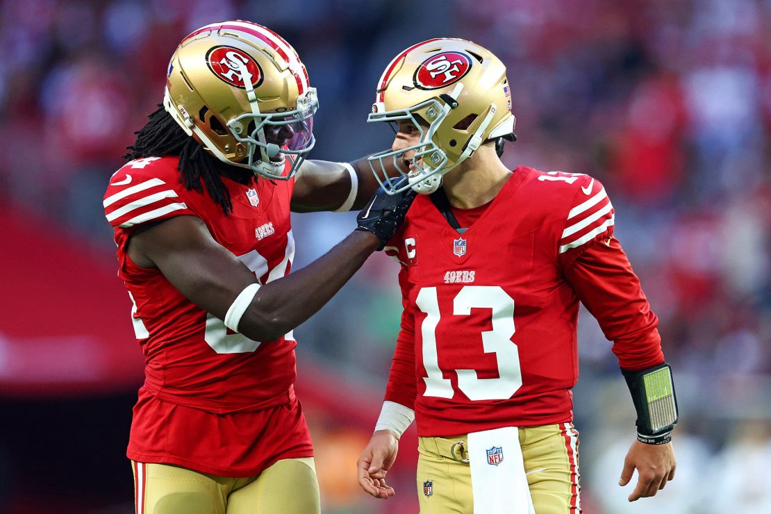 Dec 17, 2023; Glendale, Arizona, USA; San Francisco 49ers quarterback Brock Purdy (13) celebrates with San Francisco 49ers wide receiver Chris Conley (84) after a play during the fourth quarter against the Arizona Cardinals at State Farm Stadium. Mandatory Credit: Mark J. Rebilas-USA TODAY Sports