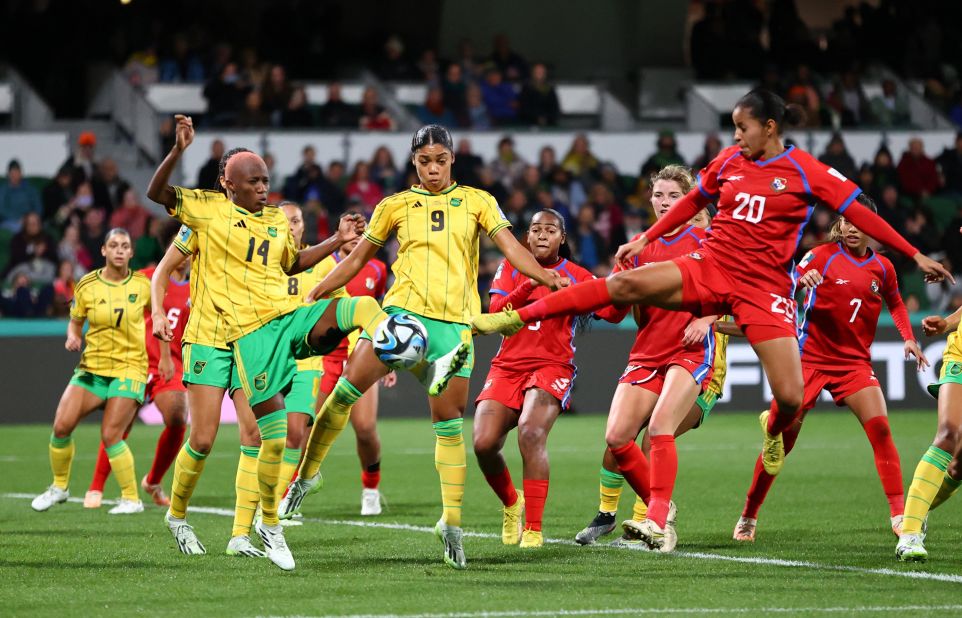 Panama's Aldrith Quintero, right, reaches for the ball in front of Jamaica's Deneisha Blackwood and Kameron Simmonds on July 29. <a href=