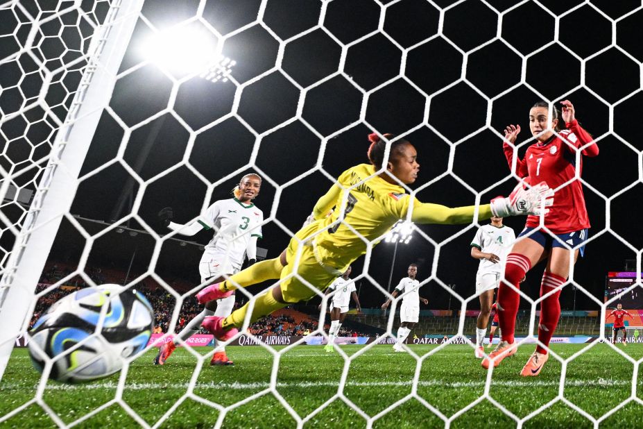 Costa Rican midfielder Melissa Herrera, right, scores her team's lone goal.