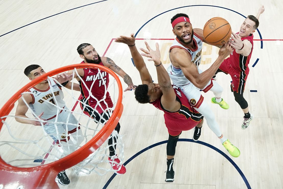 DENVER, COLORADO - JUNE 12: Bruce Brown #11 of the Denver Nuggets drives to the basket against Kyle Lowry #7 of the Miami Heat during the first half in Game Five of the 2023 NBA Finals at Ball Arena on June 12, 2023 in Denver, Colorado. NOTE TO USER: User expressly acknowledges and agrees that, by downloading and or using this photograph, User is consenting to the terms and conditions of the Getty Images License Agreement. (Photo by Jack Dempsey/Pool/Getty Images)