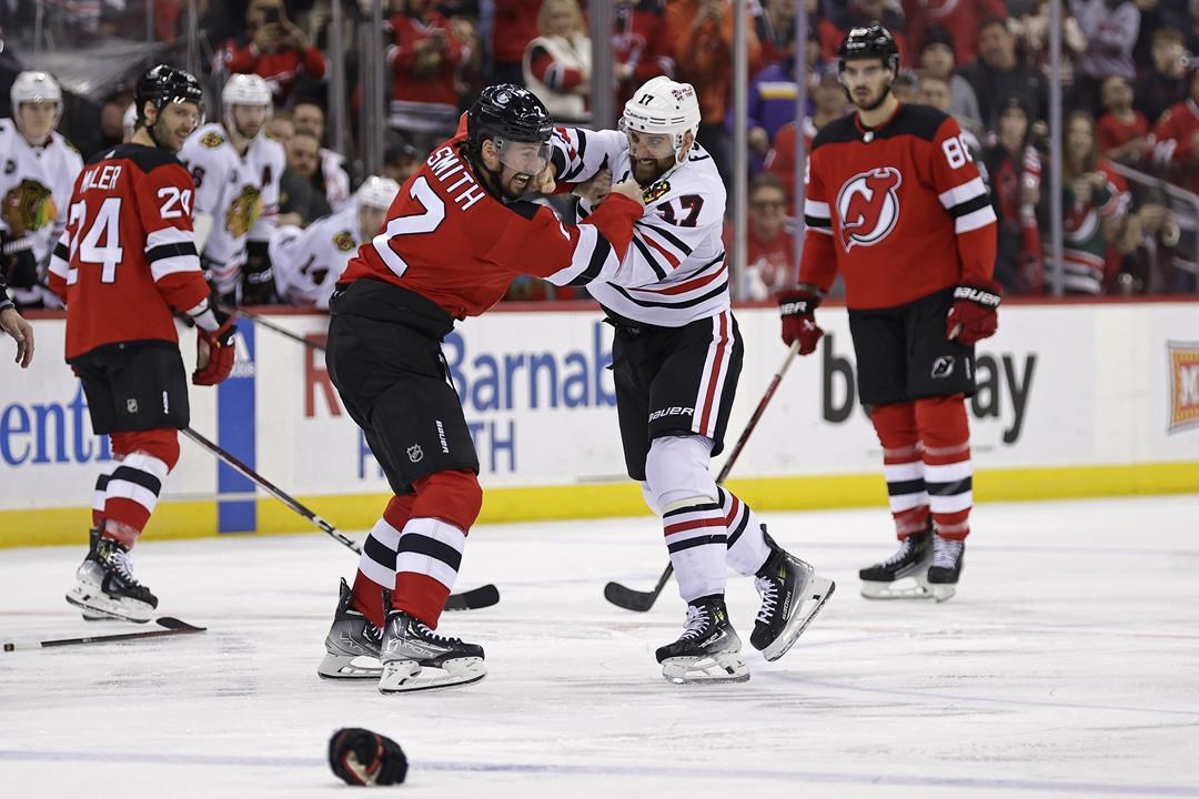 Connor Bedard Departs After Big Hit As Chicago Blackhawks Lose 4-2 To New Jersey Devils ...