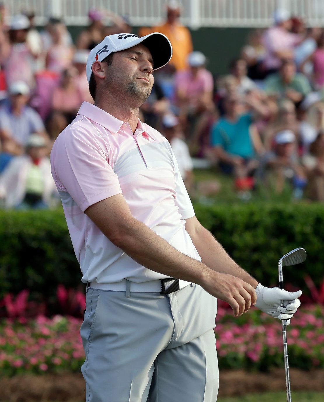 García reacts to sending his second consecutive tee shot into the lake.