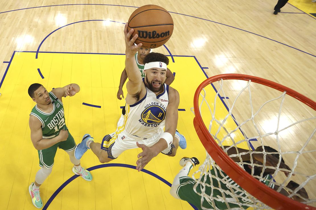 Thompson drives to the basket against the Boston Celtics during the 2022 NBA Finals. Golden State went on to win the series in six games.