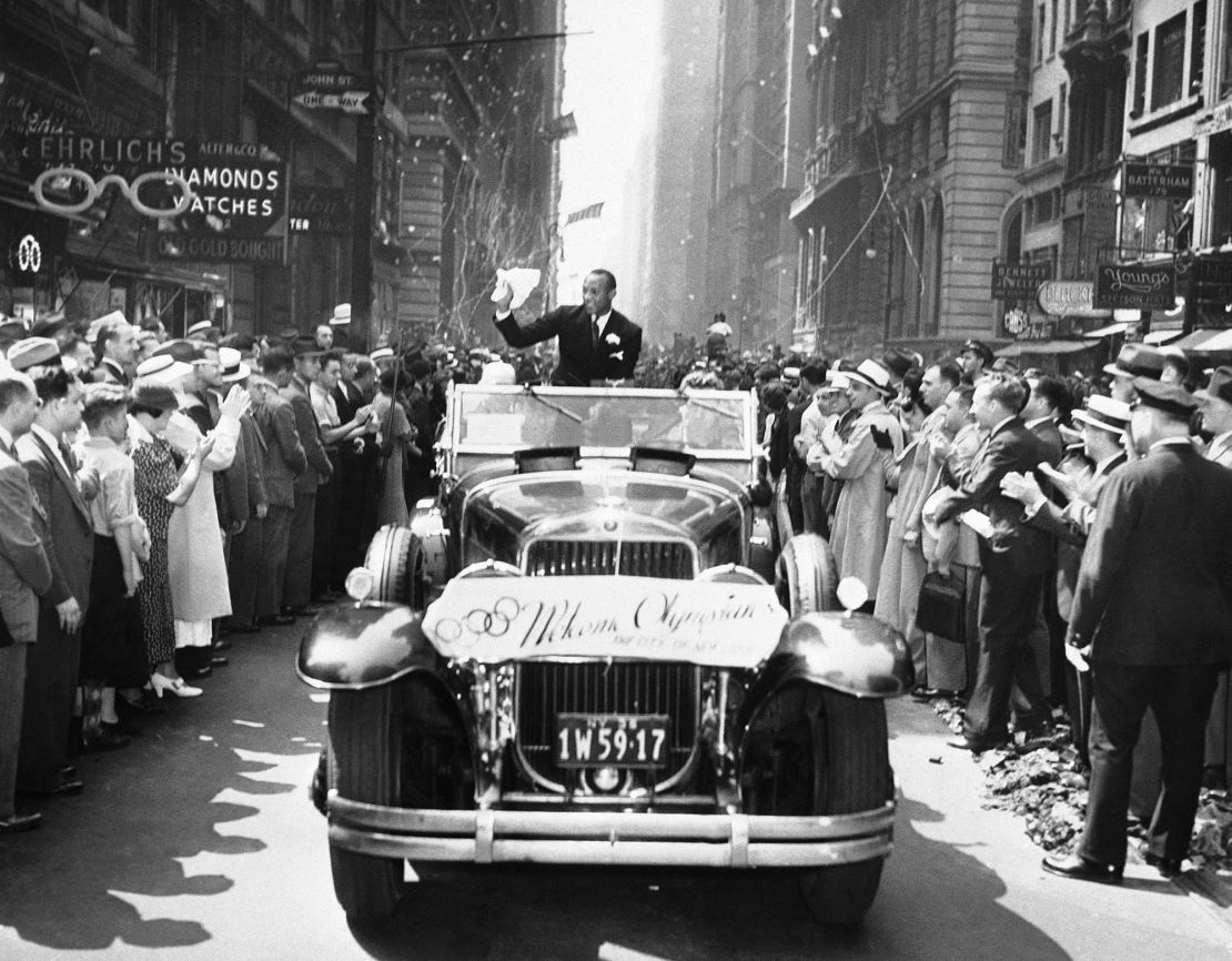 Owens received a rapturous welcome back to the US after the 1936 Olympic Games.