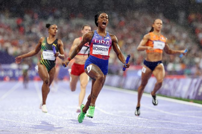 US sprinter Sha'carri Richardson celebrates after crossing the finish line <a href=