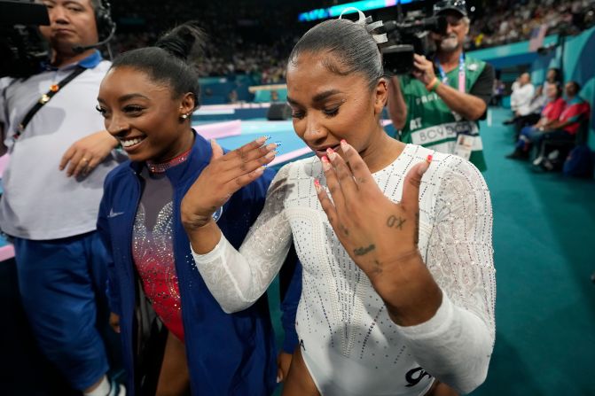 Chiles reacts after winning the bronze medal in the floor exercise. Chiles was initially in fourth, behind Romania's Ana Bărbosu, but <a href=