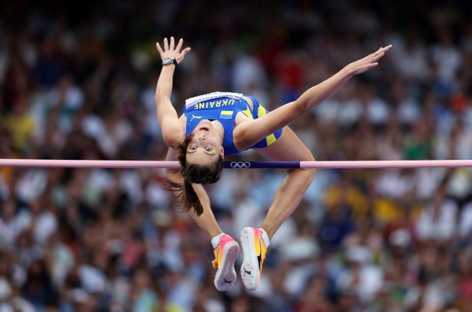 Ukrainian high jumper Yaroslava Mahuchikh clears the bar <a href=