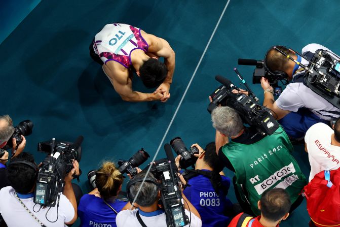 Carlos Edriel Yulo reacts after he won the floor exercise final on August 3 and made history as the <a href=