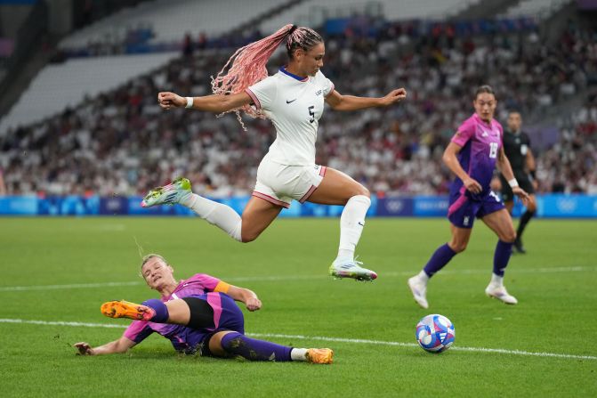 US forward Trinity Rodman jumps over Germany's Alexandra Popp during <a href=