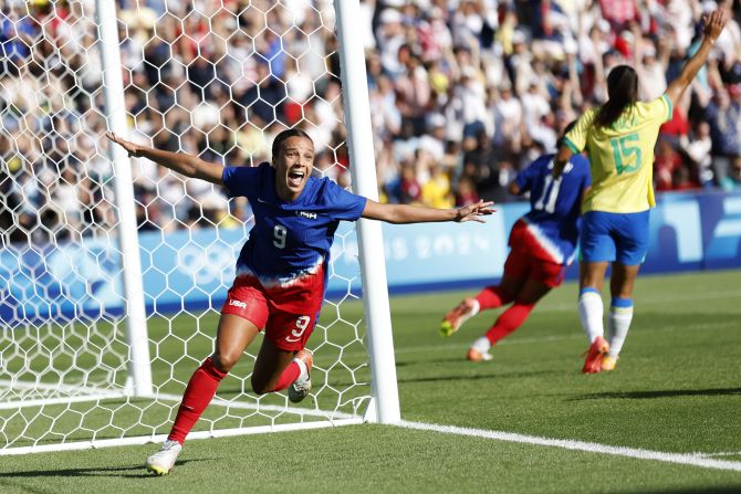 The United States' Mallory Swanson celebrates after scoring a goal against Brazil in the women's soccer final on August 10. The Americans won 1-0 to <a href=