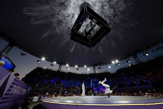 France's Danis Civil, known as B-Boy Dany Dann, right, and Canada's Philip Kim, known as B-Boy Phil Wizard, compete in the gold-medal breaking competition August 10. Kim won the gold.