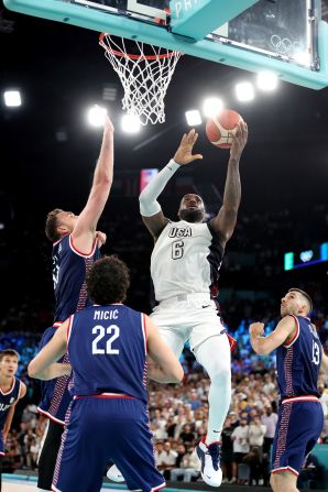 LeBron James rises for a layup during a semifinal game against Serbia on August 8. James and Team USA trailed by 13 at the end of the third quarter, but <a href=