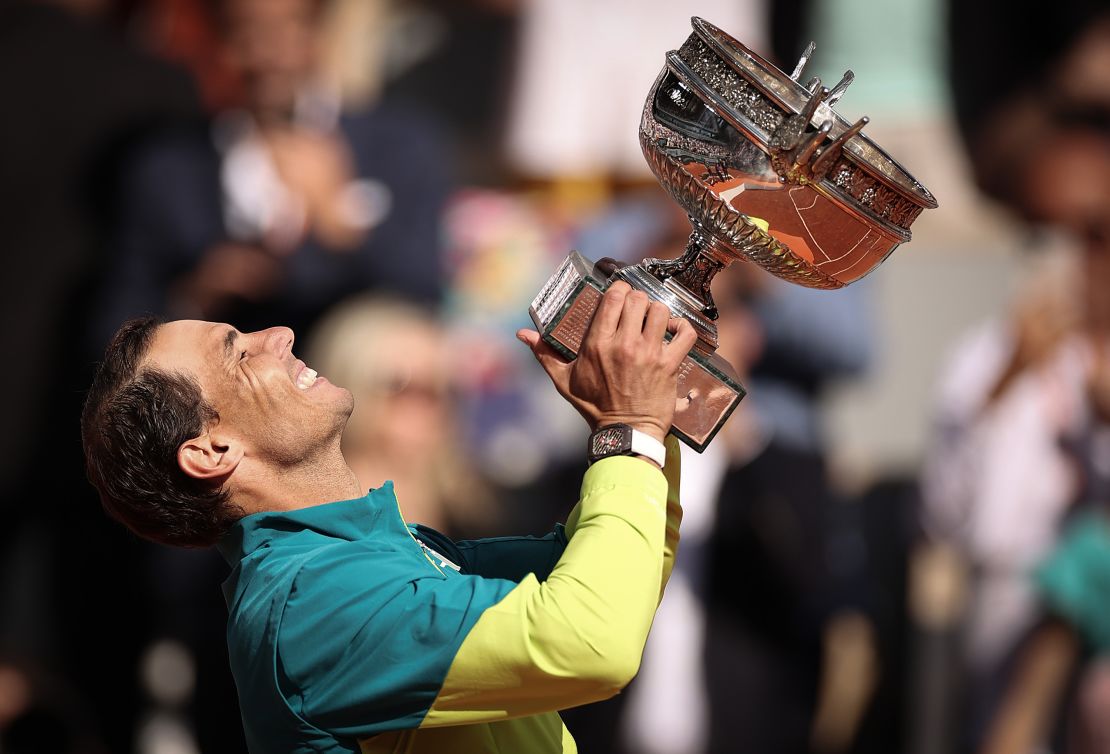 PARIS, FRANCE - JUNE 05: Rafael Nadal of Spain celebrates with the trophy after winning against Casper Ruud of Norway during the Men's Singles Final match on Day 15 of The 2022 French Open at Roland Garros on June 05, 2022 in Paris, France. (Photo by Ryan Pierse/Getty Images)