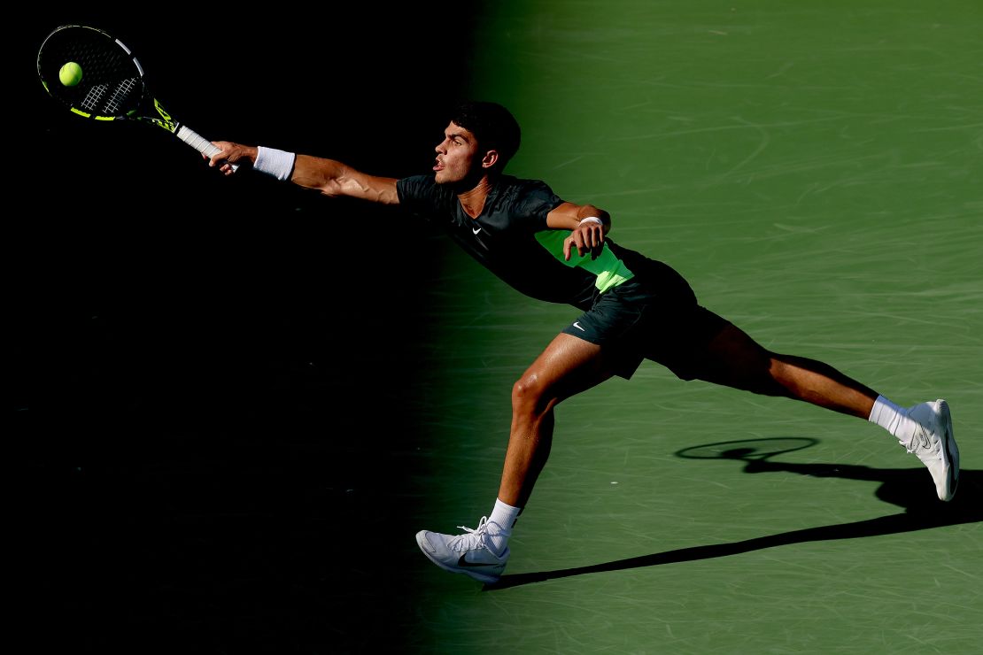 MASON, OHIO - AUGUST 20: Carlos Alcaraz of Spain stretches for a ball while playing Novak Djokovic of Serbia during the final of the Western & Southern Open at Lindner Family Tennis Center on August 20, 2023 in Mason, Ohio. (Photo by Matthew Stockman/Getty Images)