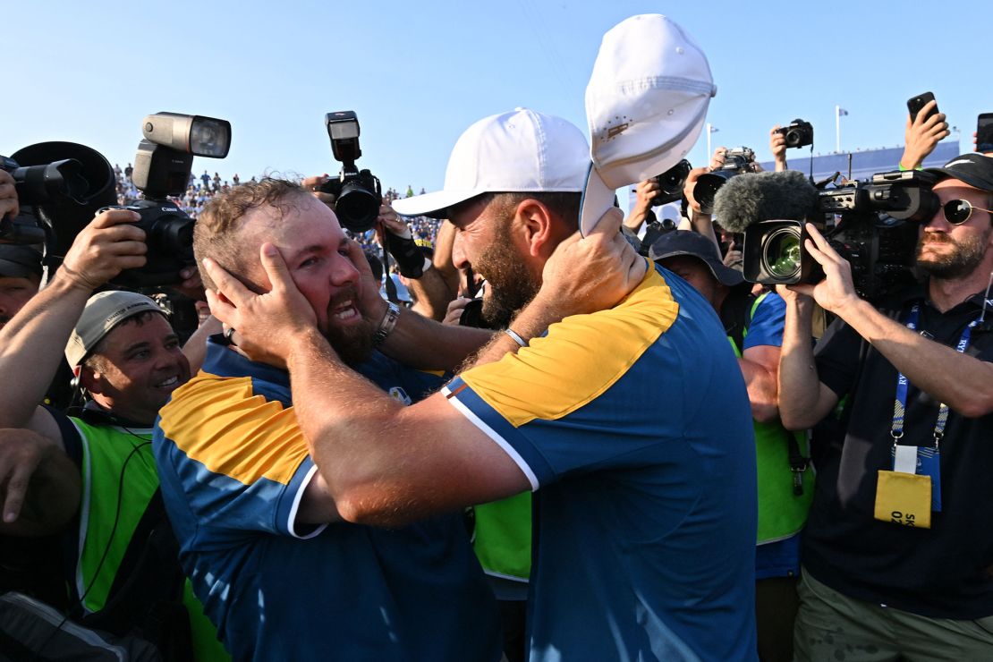 Lowry (L) and Rahm (R) celebrate triumph over the United States in Rome.