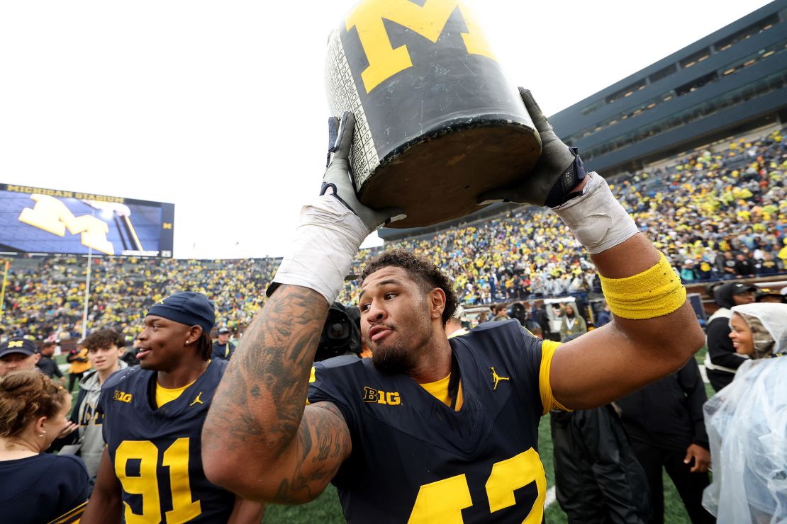 TJ Guy of the Michigan Wolverines celebrates after defeating the Minnesota Golden Gophers.