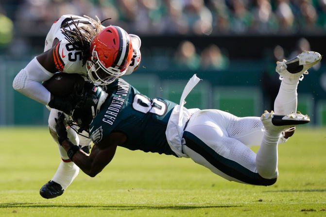 Philadelphia Eagles safety C.J. Gardner-Johnson stops Cleveland Browns tight end David Njoku in Philadelphia on October 13. The Eagles won 20-16.