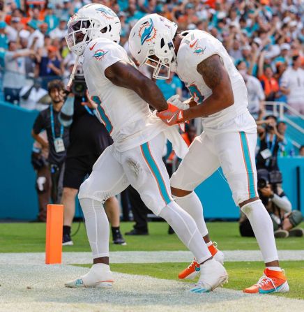 Miami Dolphins wide receivers Tyreek Hill and Jaylen Waddle celebrate a touchdown during a 20-17 victory over the Jacksonville Jaguars in Miami Gardens, Florida, on September 8. Hill was <a href=