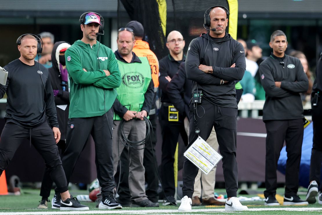 Oct 15, 2023; East Rutherford, New Jersey, USA; New York Jets injured quarterback Aaron Rodgers (left) and head coach Robert Saleh on the sidelines during the first quarter against the Philadelphia Eagles at MetLife Stadium. Mandatory Credit: Brad Penner-USA TODAY Sports