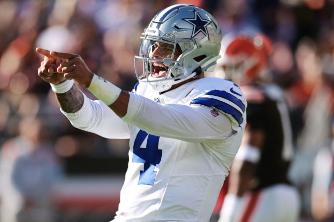 Dallas Cowboys quarterback Dak Prescott celebrates after a touchdown during the Cowboys' 33-17 victory over the Cleveland Browns in Cleveland on September 8. Hours before the game, <a href=