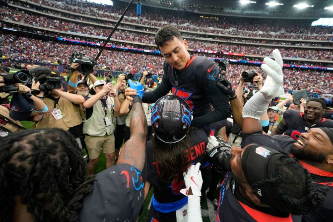 Houston Texans kicker Ka'imi Fairbairn celebrates with teammates after kicking a 59-yard field goal on the last play of his team's victory over the Buffalo Bills in Houston on October 6.