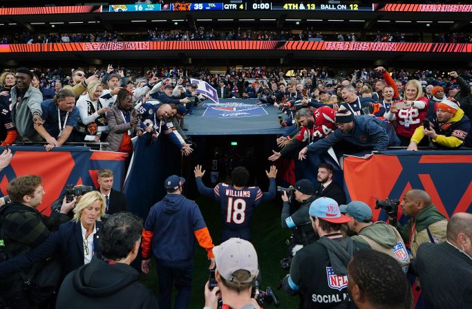 Chicago Bears quarterback Caleb Williams walks down the tunnel after his team <a href=