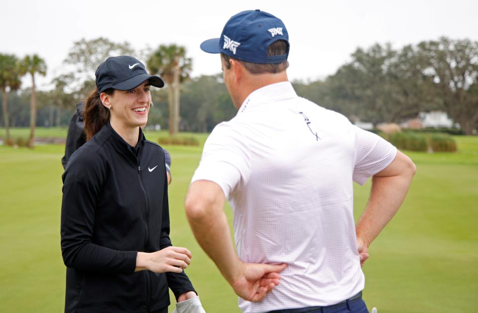 ST SIMONS ISLAND, GEORGIA - NOVEMBER 20: WNBA player Caitlin Clark and Zach Johnson talk during the Pro-Am prior to The RSM Classic 2024 at Sea Island Resort on November 20, 2024 in St Simons Island, Georgia. (Photo by Mike Ehrmann/Getty Images) ORG XMIT: 776222695 ORIG FILE ID: 2185788616