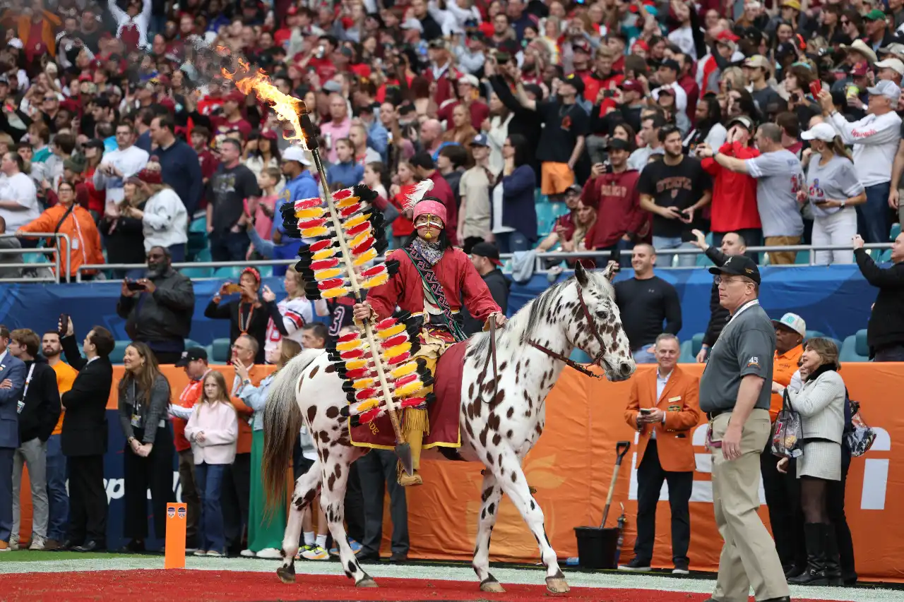 Florida State Seminoles mascot Chief Osceola and Renegade take the field before the game in the 2023 Orange Bowl against the Georgia Bulldogs at Hard Rock Stadium.