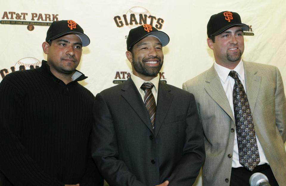 From left, Benjie Molina, Dave Roberts, and Rich Aurilia introduced during a news conference in San Francisco in Dec. 2006.